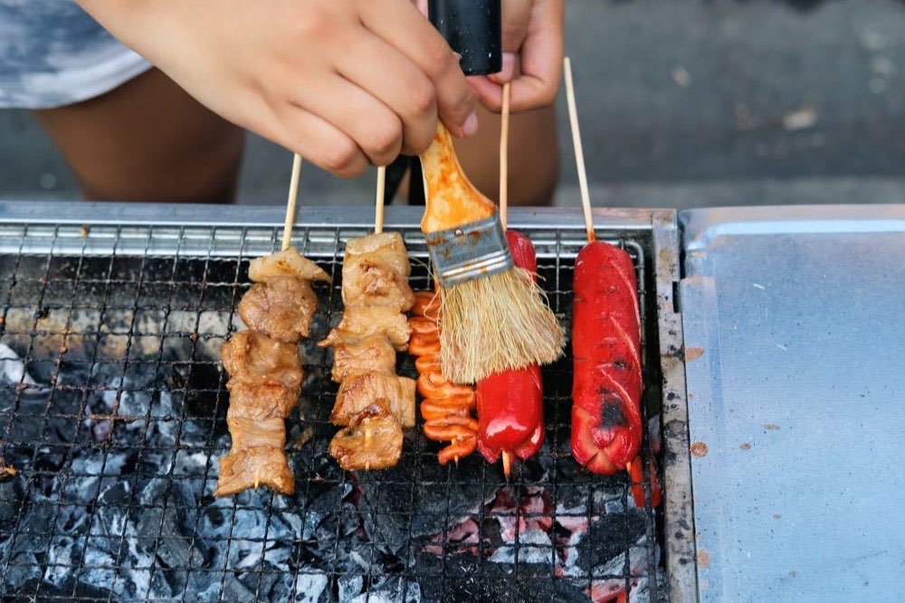 Filipino isaw grilled skewers, a popular street food