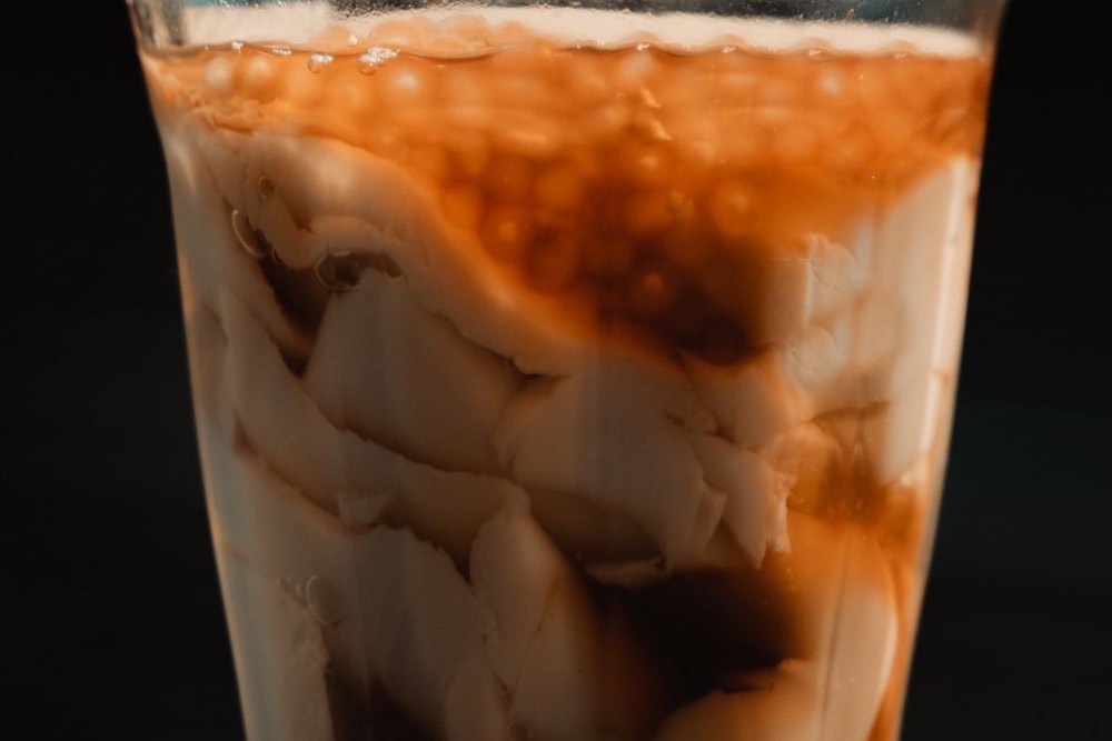 Filipino taho, warm silken tofu with arnibal syrup and sago pearls